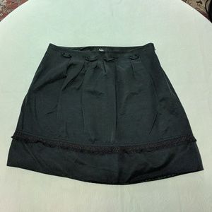black a line skirt with ruffle/fringe/ribbon trim